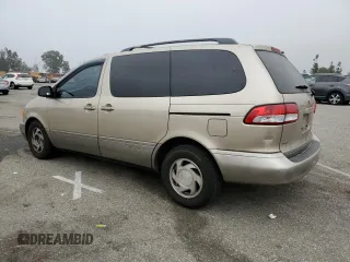 2001 Toyota Sienna LE with VIN 4T3ZF13C01U333507, listed as a Copart auction lot 86604984 with 192,377 mi miles and Salvage Title. Bid and sale history available at carsss.com. Image 2.