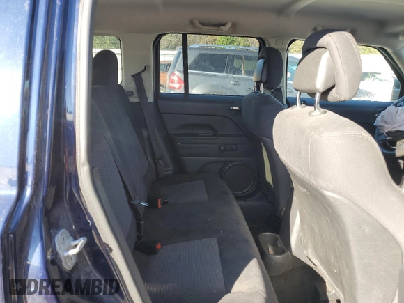 2013 Jeep Patriot Sport z VIN 1C4NJPBA3DD130144, wystawiony jako Copart lot #74302753 z przebiegiem 128 813 mil mil oraz Szkoda całkowita • Salvage title. Historia ofert i sprzedaży dostępna na DreamBid. Obrazek 11.