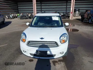 2013 MINI Countryman with VIN WMWZB3C52DWR35806, listed as a IAAI auction lot 42184010 with 93,380 mi miles and . Bid and sale history available at DreamBid. Image 12.