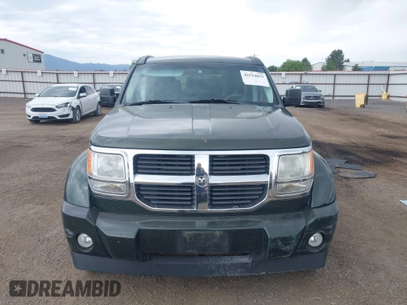2010 Dodge Nitro SE z VIN 1D4PU2GK4AW125087, wystawiony jako IAAI lot #42554853 z przebiegiem 82 282 mil mil oraz . Historia ofert i sprzedaży dostępna na DreamBid. Obrazek 13.