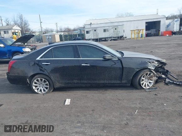 2015 Cadillac CTS Luxury AWD with VIN 1G6AX5SX3F0130311, listed as a IAAI auction lot 41299375 with 134,793 mi miles and . Bid and sale history available at DreamBid. Image 13.
