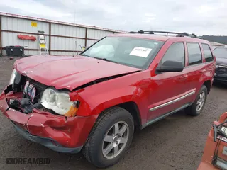 2009 Jeep Grand Cherokee Laredo with VIN 1J8GR48K99C549346, listed as a IAAI auction lot 41870627 with 170,949 mi miles. Bid and sale history available at carsss.com. Image 2.