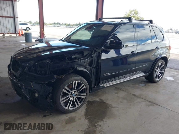 2013 BMW X5 xDrive50i with VIN 5UXZV8C58D0C16278, listed as a IAAI auction lot 41777496 with 138,547 mi miles and . Bid and sale history available at DreamBid. Image 17.