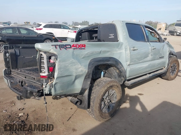 2022 Toyota Tacoma SR with VIN 3TYCZ5AN2NT096491, listed as a IAAI auction lot 42093897 with 47,041 mi miles and . Bid and sale history available at DreamBid. Image 4.