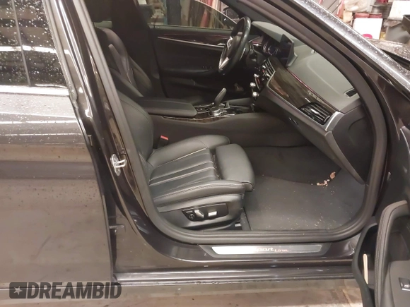 2019 BMW 5 Series 540i xDrive with VIN WBAJE7C53KWW12941, listed as a IAAI auction lot 41016611 with 77,499 mi miles and . Bid and sale history available at DreamBid. Image 5.