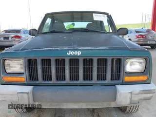 2000 Jeep Cherokee SE z VIN 1J4FT27P0YL185249, wystawiony jako IAAI lot #42650722 z przebiegiem 129 092 mil mil oraz . Historia ofert i sprzedaży dostępna na DreamBid. Obrazek 6.