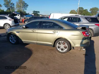 2013 Ford Taurus SEL with VIN 1FAHP2E91DG235771, listed as a IAAI auction lot 40210537 with 179,780 mi miles and . Bid and sale history available at carsss.com. Image 15.