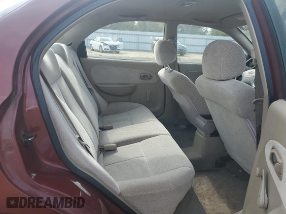 2003 Kia Spectra with VIN KNAFB121935241589, listed as a Copart auction lot 71933194 with 61,738 mi miles and Salvage Title. Bid and sale history available at DreamBid. Image 10.
