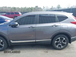 2018 Honda CR-V Touring with VIN 7FARW1H9XJE018575, listed as a IAAI auction lot 41747192 with 83,699 mi miles and . Bid and sale history available at carsss.com. Image 14.