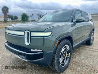 2023 Rivian R1S Launch Edition with VIN 7PDSGABL2PN003733, listed as a Copart auction lot 56033315 with 9,996 mi miles and Salvage Title. Bid and sale history available at carsss.com. Image 2.