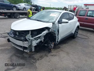 2019 Toyota C-HR XLE z VIN NMTKHMBX9KR095031, wystawiony jako IAAI lot #42191087 z przebiegiem 102 167 mil mil oraz . Historia ofert i sprzedaży dostępna na DreamBid. Obrazek 2.