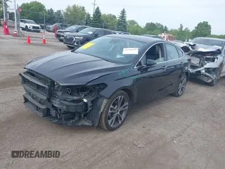 2020 Ford Fusion Titanium with VIN 3FA6P0K94LR117138, listed as a IAAI auction lot 42345819 with 88,117 mi miles and . Bid and sale history available at DreamBid. Image 2.
