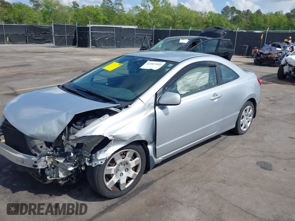 2010 Honda Civic Cpe LX with VIN 2HGFG1B68AH530485, listed as a IAAI auction lot 41907809 with 275,653 mi miles. Bid and sale history available at carsss.com. Image 17.