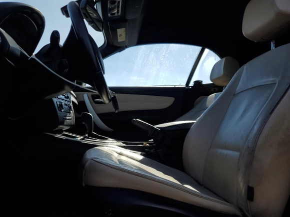 2012 BMW 1 Series 128i с VIN WBAUN1C5XCVH84372, выставлен на аукционе Copart как лот 89155145 с пробегом Не указан миль и Чистый • Clean title. История ставок и продаж доступна на DreamBid. Изображение 7.
