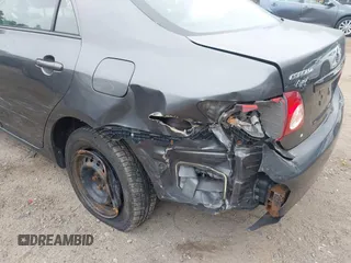 2010 Toyota Corolla with VIN 2T1BU4EEXAC317560, listed as a IAAI auction lot 42310585 with 150,589 mi miles and . Bid and sale history available at DreamBid. Image 6.