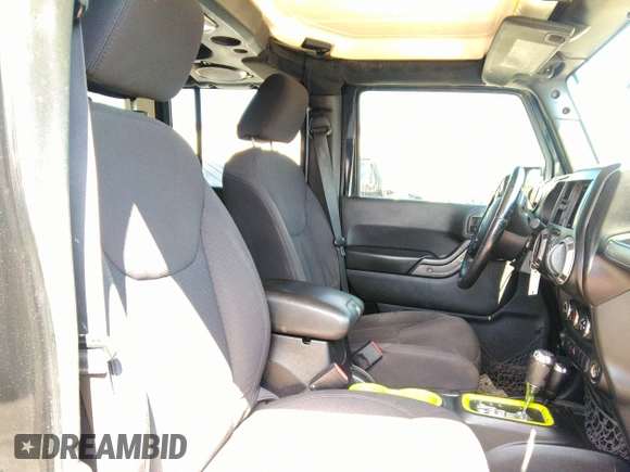 2013 Jeep Wrangler Unlimited Sport z VIN 1C4BJWDG1DL660844, wystawiony jako IAAI lot #42347284 z przebiegiem 168 709 mil mil oraz . Historia ofert i sprzedaży dostępna na DreamBid. Obrazek 5.