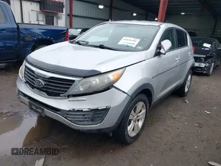 2012 Kia Sportage LX with VIN KNDPB3A27C7290386, listed as a IAAI auction lot 41634101 with 116,807 mi miles. Bid and sale history available at carsss.com. Image 2.