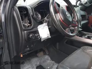 2019 Ram 1500 Rebel z VIN 1C6SRFLT2KN900600, wystawiony jako IAAI lot #41307832 z przebiegiem 74 481 mil mil oraz . Historia ofert i sprzedaży dostępna na DreamBid. Obrazek 19.