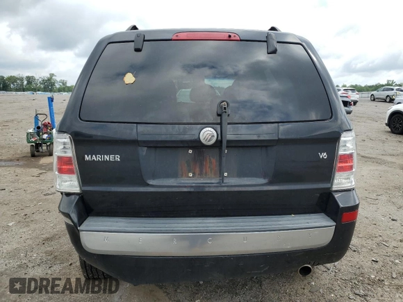 2008 Mercury Mariner z VIN 4M2CU81118KJ29141, wystawiony jako Copart lot #60014865 z przebiegiem 135 905 mil mil oraz Szkoda całkowita • Salvage title. Historia ofert i sprzedaży dostępna na DreamBid. Obrazek 6.