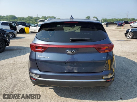2021 Kia Sportage EX z VIN KNDPNCACXM7873312, wystawiony jako Copart lot #59749665 z przebiegiem 131 347 mil mil oraz Czysty tytuł • Clean title. Historia ofert i sprzedaży dostępna na DreamBid. Obrazek 6.