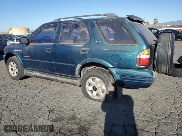 1999 Isuzu Rodeo S with VIN 4S2CK58W1X4349947, listed as a Copart auction lot 84634064 with 135,851 mi miles and Clean Title. Bid and sale history available at DreamBid. Image 2.