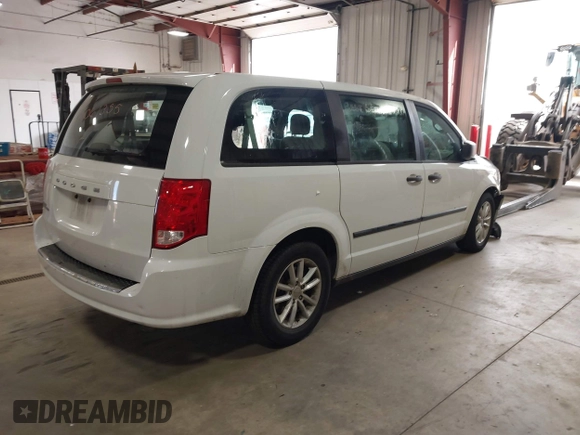 2014 Dodge Grand Caravan American Value with VIN 2C4RDGBG7ER345277, listed as a IAAI auction lot 42061355 with 145,889 mi miles and . Bid and sale history available at DreamBid. Image 4.