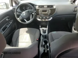 2017 Kia Rio LX z VIN KNADM4A39H6044042, wystawiony jako Copart lot #53063165 z przebiegiem Nie podano mil oraz Szkody całkowita. Historia ofert i sprzedaży dostępna na DreamBid. Obrazek 8.