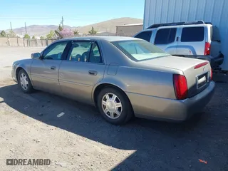 2003 Cadillac DeVille with VIN 1G6KD54Y43U136688, listed as a IAAI auction lot 41860719 with 124,230 mi miles. Bid and sale history available at carsss.com. Image 3.