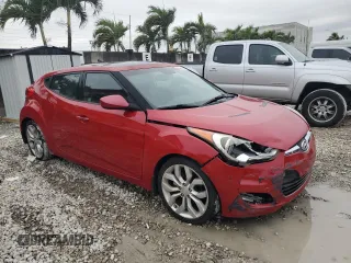2012 Hyundai Veloster w/Gray Int with VIN KMHTC6AD1CU064985, listed as a Copart auction lot 42487355 with 84,475 mi miles and Salvage title. Bid and sale history available at DreamBid. Image 4.