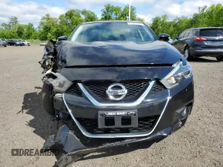 2018 Nissan Maxima SV with VIN 1N4AA6AP6JC401283, listed as a Copart auction lot 57285845 with 71,717 mi miles and Clean title. Bid and sale history available at DreamBid. Image 5.