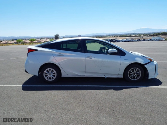 2021 Toyota Prius L Eco with VIN JTDKAMFU9M3133528, listed as a IAAI auction lot 41950856 with 138,787 mi miles. Bid and sale history available at carsss.com. Image 13.