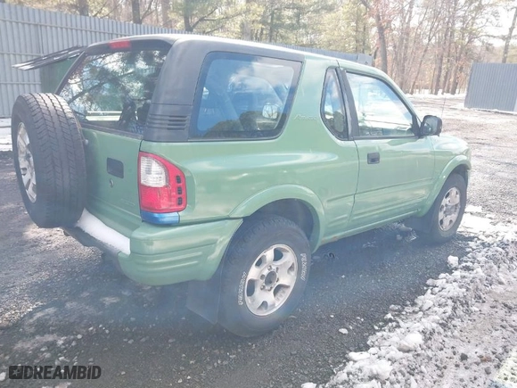 1999 Isuzu Rodeo Sport with VIN 4S2CM57WXX4365253, listed as a IAAI auction lot 41535150 with 221,024 mi miles. Bid and sale history available at carsss.com. Image 4.