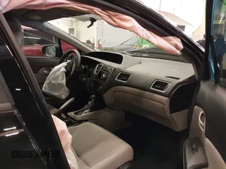 2014 Honda Civic LX z VIN 19XFB2F56EE007360, wystawiony jako IAAI lot #41578027 z przebiegiem 52 861 mil mil oraz . Historia ofert i sprzedaży dostępna na DreamBid. Obrazek 5.