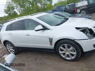 2014 Cadillac SRX Performance Collection with VIN 3GYFNCE34ES519059, listed as a IAAI auction lot 42237351 with 80,578 mi miles and . Bid and sale history available at DreamBid. Image 14.