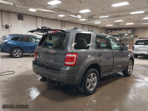 2011 Ford Escape XLT with VIN 1FMCU9D73BKB81871, listed as a IAAI auction lot 39857267 with 75,273 mi miles. Bid and sale history available at carsss.com. Image 4.