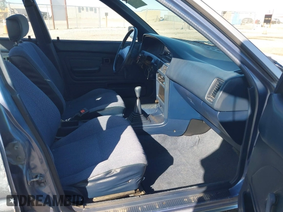 1989 Toyota Corolla with VIN JT2AE92E6K3221552, listed as a IAAI auction lot 41645601 with 634,636 mi miles and . Bid and sale history available at DreamBid. Image 5.