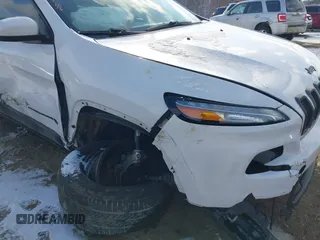 2015 Jeep Cherokee North with VIN 1C4PJMCS7FW792850, listed as a IAAI auction lot 41323432 with 102,642 mi miles. Bid and sale history available at carsss.com. Image 6.