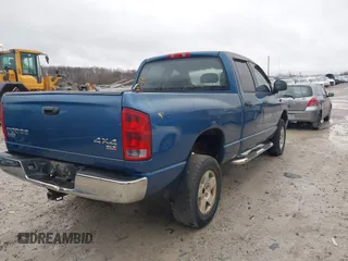 2004 Dodge 1500 SLT with VIN 1D7HU18NX4S606645, listed as a IAAI auction lot 41041951 with 180,862 mi miles and . Bid and sale history available at carsss.com. Image 4.