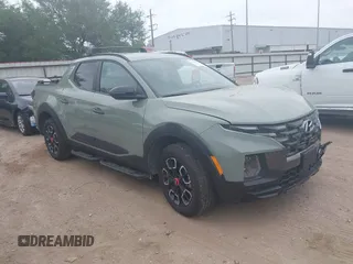 2024 Hyundai Santa Cruz XRT z VIN 5NTJDDAF2RH089915, wystawiony jako IAAI lot #42027037 z przebiegiem 10 872 mil mil oraz . Historia ofert i sprzedaży dostępna na DreamBid. Obrazek 1.