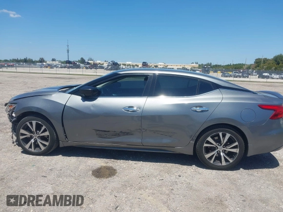 2016 Nissan Maxima SL with VIN 1N4AA6AP9GC901494, listed as a IAAI auction lot 42023106 with 160,581 mi miles and . Bid and sale history available at DreamBid. Image 15.
