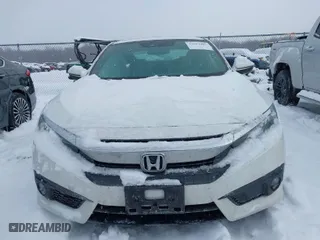 2016 Honda Civic Coupe Touring with VIN 2HGFC3B91GH351389, listed as a IAAI auction lot 41612467 with 78,934 mi miles. Bid and sale history available at carsss.com. Image 12.