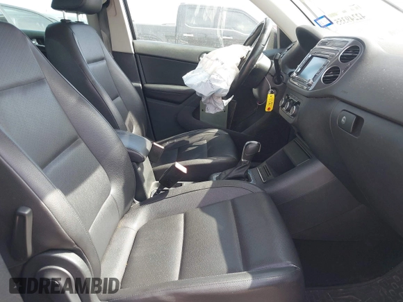 2012 Volkswagen Tiguan SE with VIN WVGAV7AX6CW521960, listed as a IAAI auction lot 42249355 with 118,496 mi miles and . Bid and sale history available at DreamBid. Image 5.