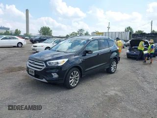 2018 Ford Escape Titanium z VIN 1FMCU9J9XJUB66275, wystawiony jako IAAI lot #42757952 z przebiegiem 97 629 mil mil oraz . Historia ofert i sprzedaży dostępna na DreamBid. Obrazek 17.