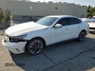 2024 BMW 5 Series 530i xDrive with VIN WBA53FJ07RCR27651, listed as a Copart auction lot 67997984 with 3,694 mi miles and Salvage Title. Bid and sale history available at carsss.com. Image 1.