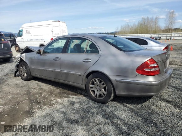 2003 Mercedes-Benz E-Class 3.2L with VIN WDBUF65J33A220573, listed as a Copart auction lot 52085375 with 142,536 mi miles and Salvage Title. Bid and sale history available at carsss.com. Image 2.