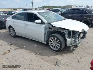 2014 Toyota Avalon Limited with VIN 4T1BK1EB0EU127927, listed as a IAAI auction lot 41765527 with 158,077 mi miles. Bid and sale history available at carsss.com. Image 1.