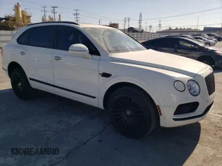 2018 Bentley Bentayga Signature z VIN SJAAC4ZV9JC020797, wystawiony jako Copart lot #72076174 z przebiegiem 78 619 mil mil oraz Szkoda całkowita • Salvage title. Historia ofert i sprzedaży dostępna na DreamBid. Obrazek 4.