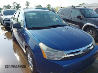2009 Ford Focus SE z VIN 1FAHP35N39W191045, wystawiony jako IAAI lot #42478519 z przebiegiem 149 670 mil mil oraz . Historia ofert i sprzedaży dostępna na DreamBid. Obrazek 1.