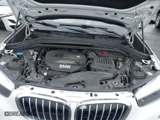 2018 BMW X1 sDrive28i with VIN WBXHU7C32J5H44246, listed as a IAAI auction lot 41477050 with 69,858 mi miles. Bid and sale history available at carsss.com. Image 10.