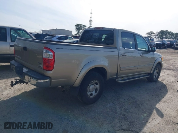 2004 Toyota Tundra SR5 with VIN 5TBET34144S447959, listed as a IAAI auction lot 41752378 with 301,993 mi miles and . Bid and sale history available at DreamBid. Image 4.